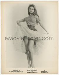 2h890 THAT NAUGHTY GIRL 8x10.25 still 1958 full-length sexy Brigitte Bardot lifting her skirt!