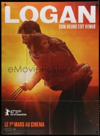 2k733 LOGAN teaser French 1p 2017 Jackman in the title role as Wolverine holding Dafne Keen!