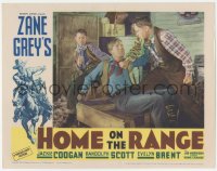 2m503 HOME ON THE RANGE LC 1934 Zane Grey, c/u of Randolph Scott fighting two bad guys at once!