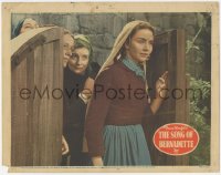 2m818 SONG OF BERNADETTE LC 1943 close up of Jennifer Jones walking through wooden gate!