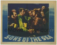 2m824 SONS OF THE SEA LC 1941 Michael Redgrave & sailors celebrate with a cask of ale!