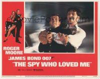 2m840 SPY WHO LOVED ME LC #2 1977 Roger Moore as James Bond squeezed by giant Richard Kiel as Jaws!