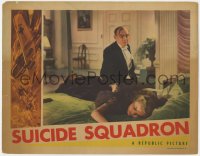 2m871 SUICIDE SQUADRON LC 1941 man in tuxedo comforts sad Sally Gray laying in bed!
