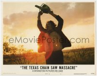 2m897 TEXAS CHAINSAW MASSACRE LC #3 1974 iconic horror image of Leatherface holding chainsaw!
