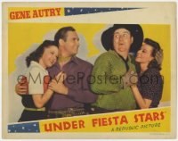 2m938 UNDER FIESTA STARS LC 1941 cowboys Gene Autry & Smiley Burnette both have pretty girls!