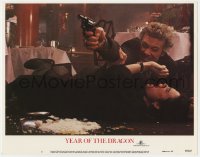 2m988 YEAR OF THE DRAGON LC #2 1985 c/u of Mickey Rourke with gun drawn protecting Ariane!