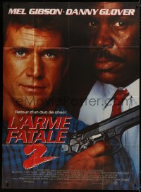 2z1013 LETHAL WEAPON 2 French 1p 1989 great close up of police partners Mel Gibson & Danny Glover!