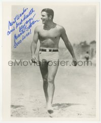 3f0979 BUSTER CRABBE signed 8x10 REPRO still 1980s full-length in swimsuit & laughing on the beach!