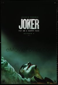 3h0405 JOKER teaser DS 1sh 2019 close-up image of clown Joaquin Phoenix, put on a happy face!