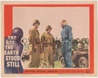 3m0284 DAY THE EARTH STOOD STILL LC #4 1951 Michael Rennie as Klaatu in full uniform by soldiers!