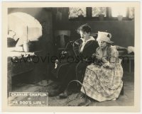 3r0195 DOG'S LIFE 8x10 LC 1918 c/u of Charlie Chaplin with pipe sitting by Edna Purviance knitting!