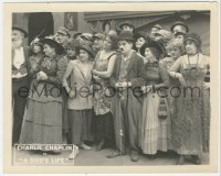 3r0194 DOG'S LIFE 8x10 LC 1918 c/u of Charlie Chaplin holding leash in a large crowd of people!
