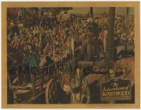 3r0984 ADVENTURES OF ROBIN HOOD LC 1938 crowd watches Errol Flynn taken away by guards on wagon!