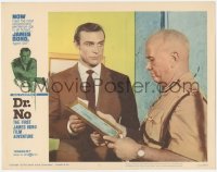 3r1106 DR. NO LC #7 1962 close up of Sean Connery as James Bond asking guard about a picture!