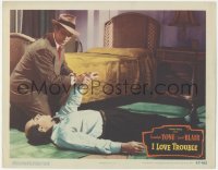 3r1196 I LOVE TROUBLE LC #7 1947 close up of Franchot Tone checking unconscious man's pulse!