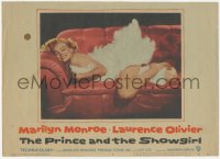 3r0033 PRINCE & THE SHOWGIRL LC #6 1957 sexiest Marilyn Monroe smiling on red couch in feathers!