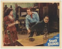 3r1370 SILVER RAIDERS LC 1950 Virginia Herrick holds gun on bad guy while Whip Wilson ties him up!