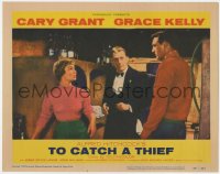 3r1444 TO CATCH A THIEF LC #4 1955 Cary Grant, Brigitte Auber & guy in wine cellar, Alfred Hitchcock
