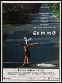 3w1297 GUMMO French 1p 1997 wacky image of half-naked man on skateboard & wearing bunny hat!