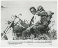3y0262 CLINT EASTWOOD signed 7.75x9.25 still 1977 on motorcycle with Sonda Locke in The Gauntlet!
