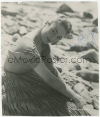 3y0385 SHIRLEY JONES signed 7.25x8.5 still 1950s pretty close portrait sitting on a rocky beach!