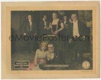 3z0526 AMONG THOSE PRESENT LC 1921 Harold Lloyd & Mildred Davis hiding from party behind chair!