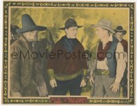 3z1303 TOLL GATE LC R1920s close up of cowboy William S. Hart standing between two bad guys!