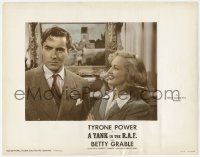 3z1385 YANK IN THE R.A.F. color-glos photolobby 1941 Betty Grable smiling at worried Tyrone Power!