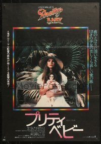 4f1080 PRETTY BABY Japanese 1978 directed by Louis Malle, young Brooke Shields sitting with doll!