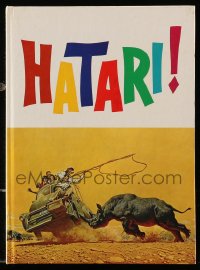 4g1299 HATARI hardcover souvenir program book 1962 Howard Hawks, John Wayne in Africa, McCarthy art!