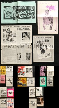 4h0994 LOT OF 29 UNCUT PRESSBOOKS 1940s-1970s advertising for a variety of different movies!