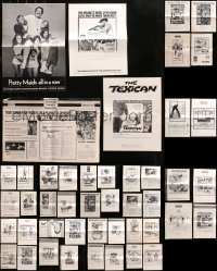 4h0987 LOT OF 46 UNCUT PRESSBOOKS 1960s-1970s advertising for a variety of different movies!