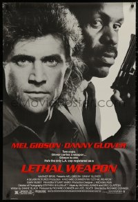 4j0956 LETHAL WEAPON 1sh 1987 great close image of cop partners Mel Gibson & Danny Glover!