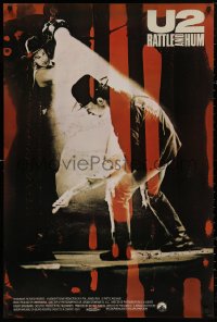 4j1168 U2 RATTLE & HUM int'l 1sh 1988 great image of rockers Bono & The Edge performing on stage!