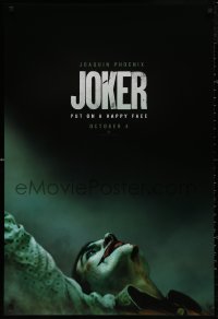 4s0990 JOKER teaser DS 1sh 2019 close-up image of clown Joaquin Phoenix, put on a happy face!