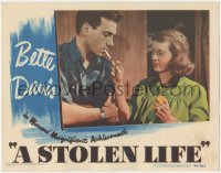 4w0789 STOLEN LIFE LC 1946 close up of Bette Davis lighting Dane Clark's cigarette with a match!