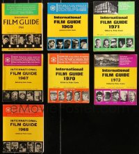 4x0544 LOT OF 7 INTERNATIONAL FILM GUIDE 1966-72 SOFTCOVER BOOKS 1966-1972 filled with movie info!