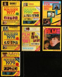4x0543 LOT OF 7 INTERNATIONAL FILM GUIDE 1977-82, 1985 SOFTCOVER BOOKS 1977-1985 filled with info!