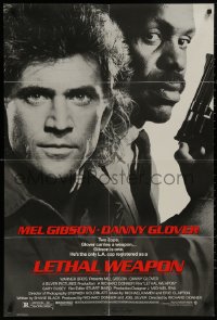 5d0657 LETHAL WEAPON 1sh 1987 great close image of cop partners Mel Gibson & Danny Glover!