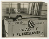 5k0207 FEET FIRST 7.75x10 still 1930 Harold Lloyd in life preserver crate with seagull on his head!
