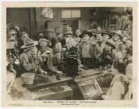 5k0252 GOIN' TO TOWN 8x10.25 still 1935 cowboys in crowded saloon drink a beer toast to Mae West!