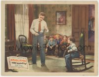5k0894 ARROWSMITH LC 1931 Ronald Colman pulling boy's tooth as kids watch, Sinclair Lewis, John Ford