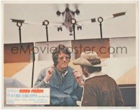 5k1009 EASY RIDER int'l LC #4 1969 close up of Peter Fonda by airport with plane flying overhead!