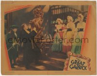 5k1076 GREAT GARRICK LC 1937 Edward Everett Horton watches Brian Aherne greet three beautiful ladies
