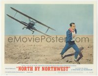 5k1289 NORTH BY NORTHWEST LC #6 R1966 Hitchcock, classic c/u of Cary Grant chased by crop duster!