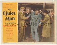 5k1338 QUIET MAN LC #2 1951 John Wayne & Victor McLaglen giving the flabby handshake, John Ford