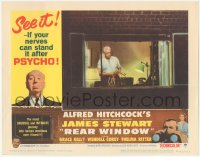 5k1348 REAR WINDOW LC #1 R1962 Alfred Hitchcock, great image of Raymond Burr with rope in window!