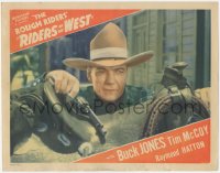 5k1358 RIDERS OF THE WEST LC 1942 best close up of cowboy Buck Jones with gun resting on saddle!