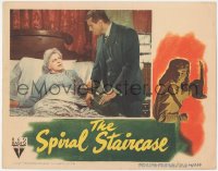 5k1441 SPIRAL STAIRCASE LC 1946 great close up of doctor Kent Smith helping Ethel Barrymore in bed!