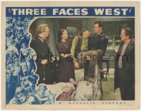 5k1491 THREE FACES WEST LC 1940 John Wayne carrying unconscious man by Charles Coburn & Gurie!